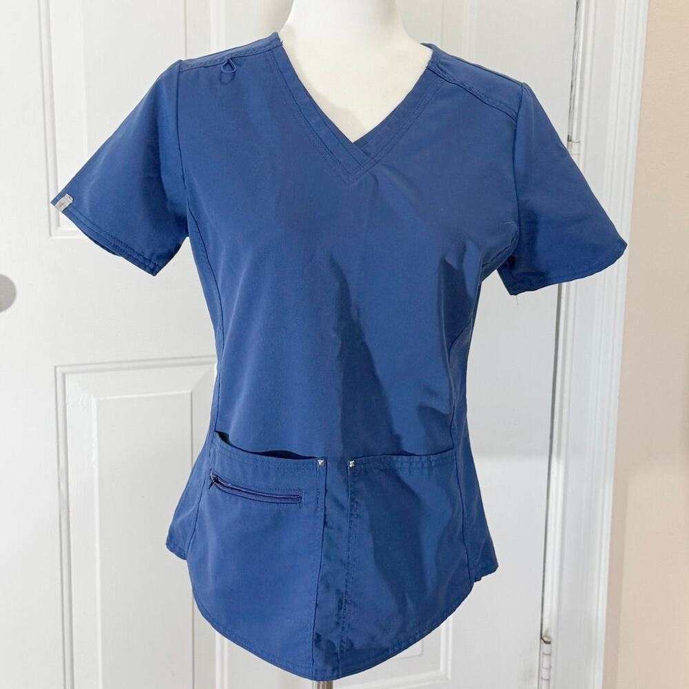 Scrubstar Ultimate XS women’s blue scrub top, three pockets badge loop